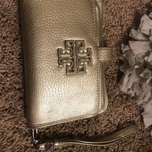 Tory Burch gold wristlet